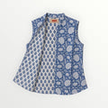 BUÍS STUDIO blue and white reversible cotton gilet with floral and leaf prints. Sleeveless, mandarin collar, and practical pockets.